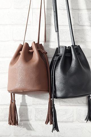 Faux Leather Bucket Bag Showcasing Tassel Detailing in Brown or Black